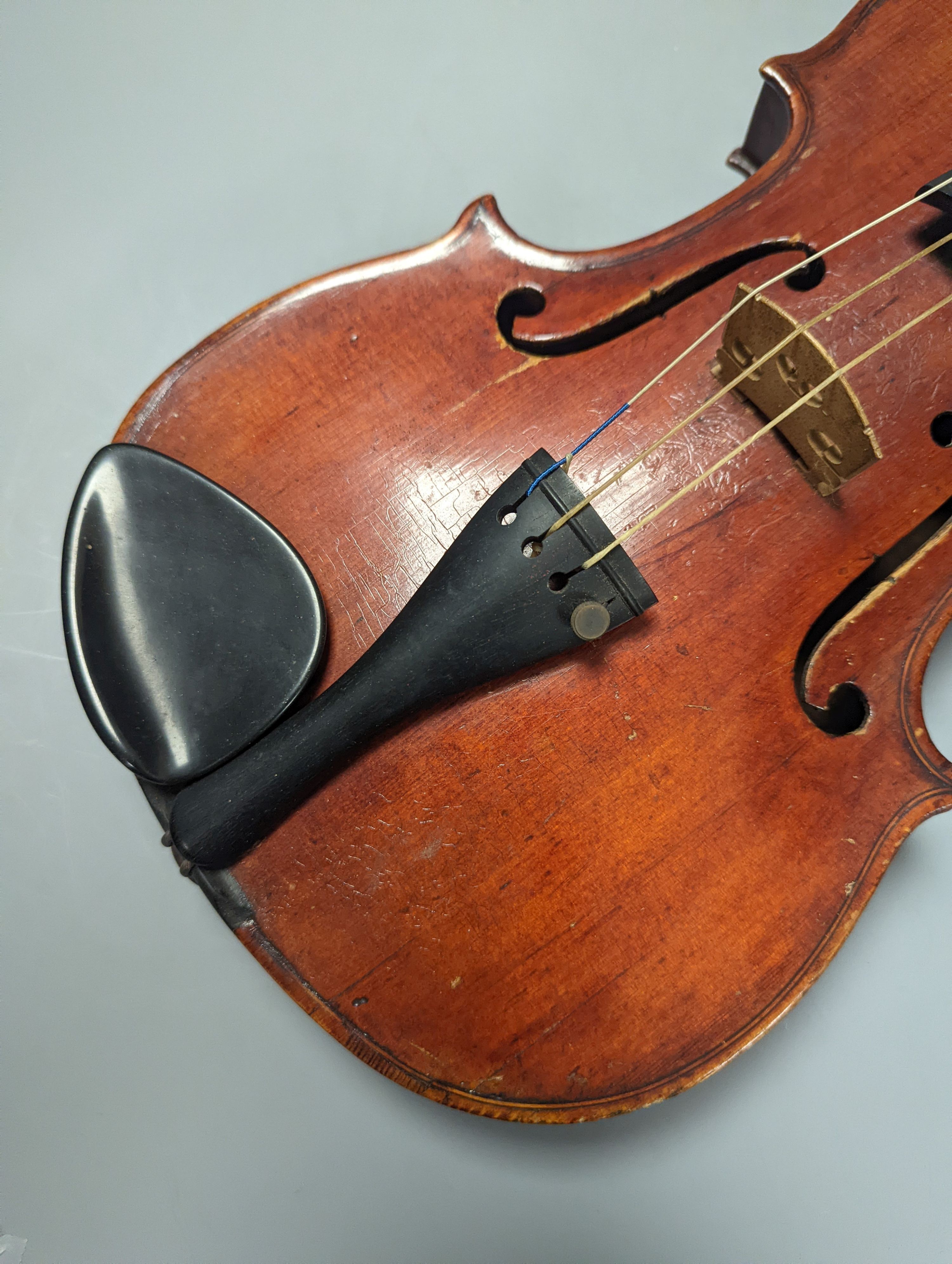 A violin in a mahogany case, case makers, Withers and sons, case 79 cms high.